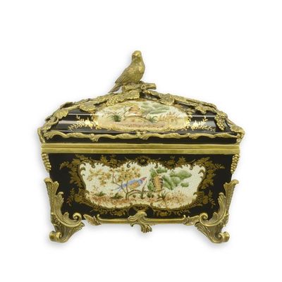A BLACK-GROUND BRONZE MOUNTED PORCELAIN BOX AND COVER