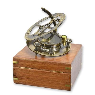 A BRASS COMPASS IN WOODEN BOX