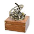 A BRASS COMPASS IN WOODEN BOX