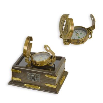 A BRASS COMPASS IN WOODEN BOX