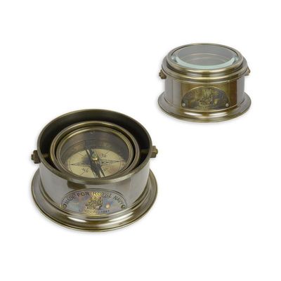 A BRASS ROYAL NAVY COMPASS