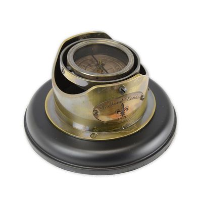 A BRASS SHIP'S COMPASS