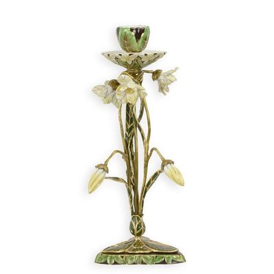 A BRONZE AND PORCELAIN FLORAL CANDLE STAND