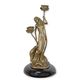 A BRONZE ART NOUVEAU CANDLEHOLDER