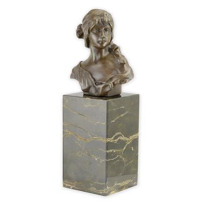 A BRONZE BUST OF A WOMAN