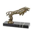 A BRONZE CAR MASCOT OF A LEAPING LION