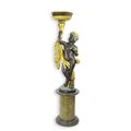 A BRONZE FIGURAL PLANTER OF A PUTTO