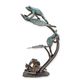 A BRONZE FOUNTAIN OF A GROUP OF FROGS ON A WATER LILY
