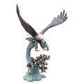 A BRONZE FOUNTAIN OF AN EAGLE HUNTING SALMON