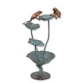 A BRONZE FROGS ON A WATER LILY FOUNTAIN