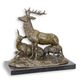 A BRONZE GROUP OF A DEER FAMILY