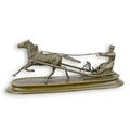 A BRONZE GROUP OF A HORSE-DRAWN SLEIGH