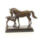 A BRONZE GROUP OF A MARE AND FOAL