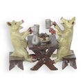 A BRONZE GROUP OF TWO PIGS HAVING DINNER