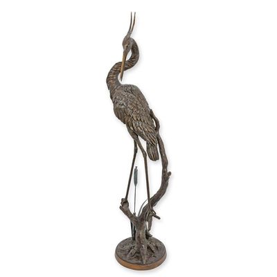 A BRONZE HERON FOUNTAIN