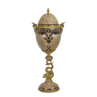A BRONZE MOUNTED EGG SHAPED JAR AND COVER