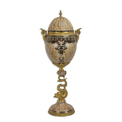 A BRONZE MOUNTED EGG SHAPED JAR AND COVER
