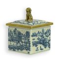 A BRONZE MOUNTED PORCELAIN BOX AND COVER