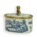 A BRONZE MOUNTED PORCELAIN BOX AND COVER