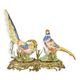 A BRONZE MOUNTED PORCELAIN GROUP OF PHEASANTS