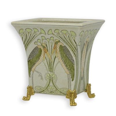 A BRONZE MOUNTED PORCELAIN PLANTER