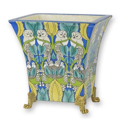 A BRONZE MOUNTED PORCELAIN PLANTER
