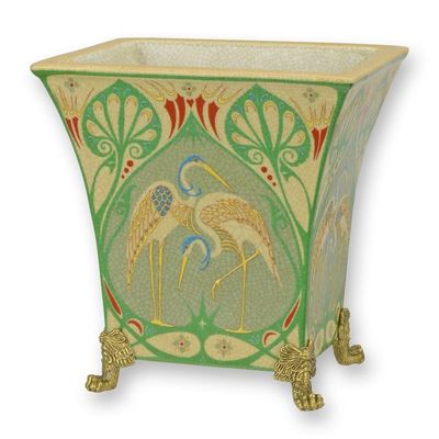 A BRONZE MOUNTED PORCELAIN PLANTER