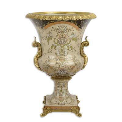 A BRONZE MOUNTED PORCELAIN URN