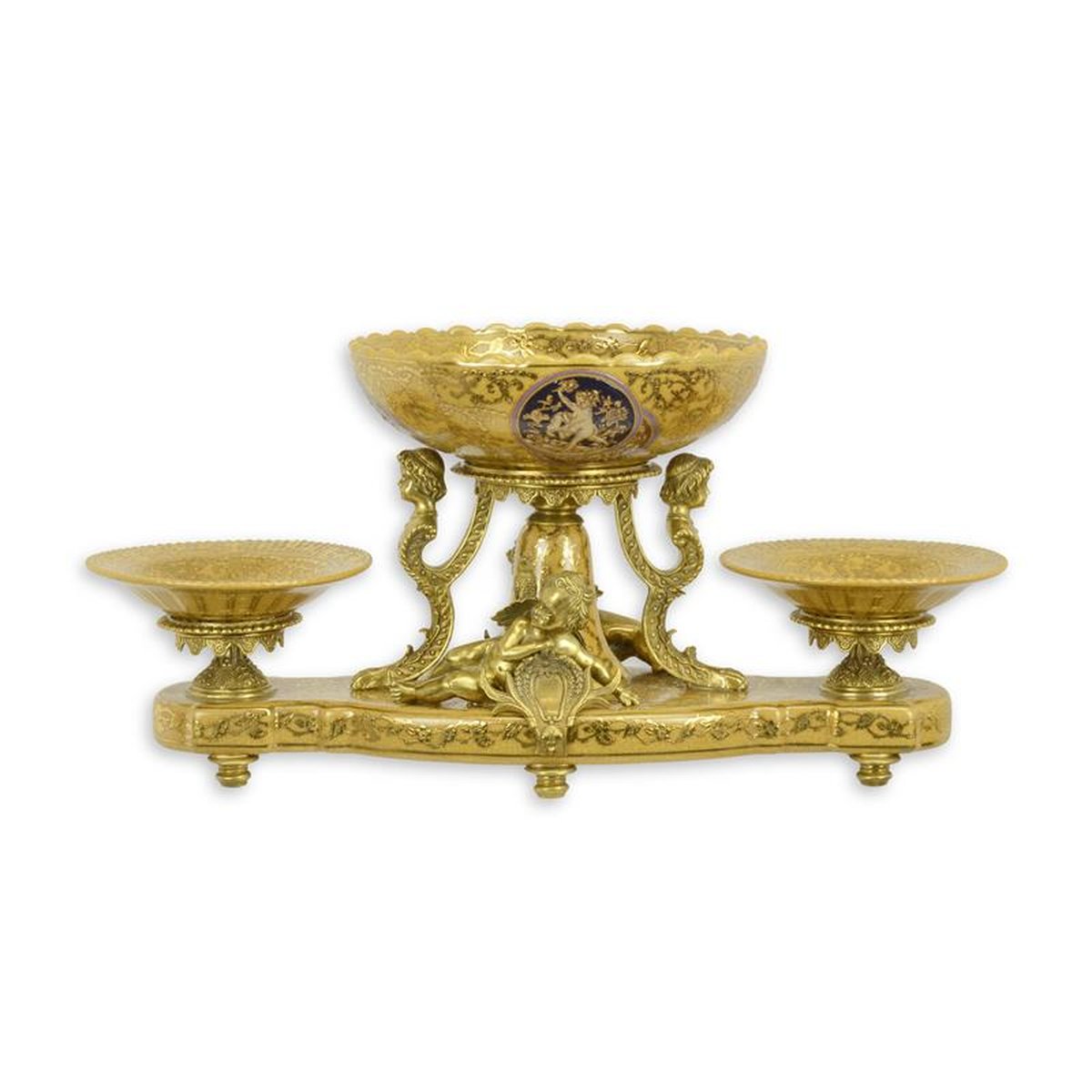 A BRONZE MOUNTED THREE-TIER PORCELAIN CENTERPIECE