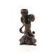 A BRONZE PUTTO CANDLESTAND