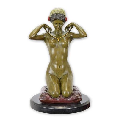 A BRONZE SCULPTURE CALLED NEW NECKLACE