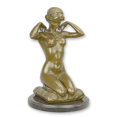 A BRONZE SCULPTURE CALLED NEW NECKLACE