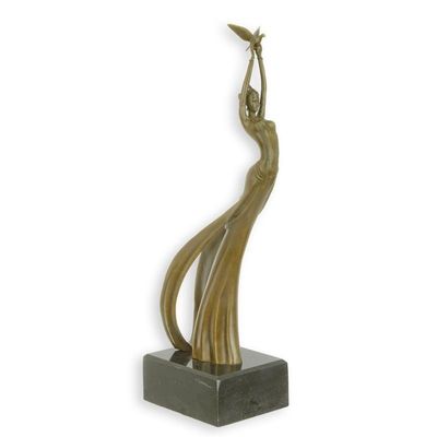 A BRONZE SCULPTURE CALLED RELEASE THE BIRD""