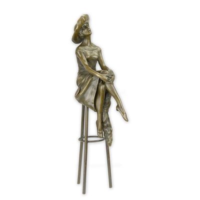 A BRONZE SCULPTURE CALLED SITTING AT THE BAR""