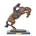 A BRONZE SCULPTURE NAMED BRONCO BUSTER""