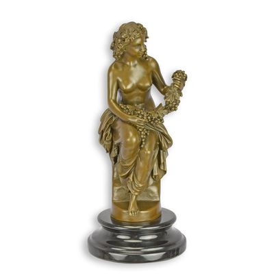 A BRONZE SCULPTURE OF A BACHANTE
