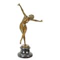 A BRONZE SCULPTURE OF A BALL DANCER