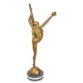 A BRONZE SCULPTURE OF A BALLERINA WITH BALL