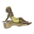 A BRONZE SCULPTURE OF A BATHING WOMAN