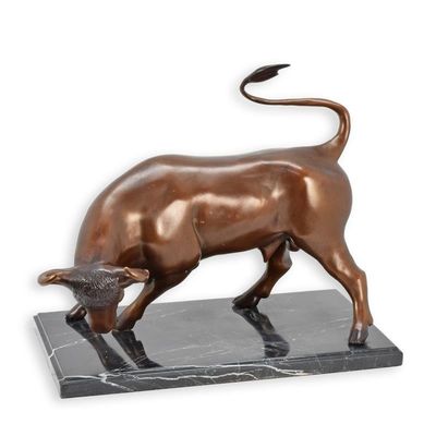 A BRONZE SCULPTURE OF A BULL