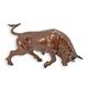 A BRONZE SCULPTURE OF A BULL
