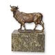 A BRONZE SCULPTURE OF A BULL