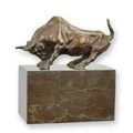 A BRONZE SCULPTURE OF A BULL