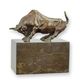 A BRONZE SCULPTURE OF A BULL