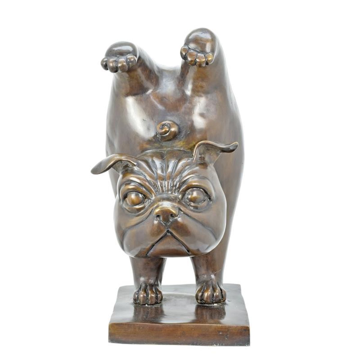 A BRONZE SCULPTURE OF A BULLDOG DOING GYMNASTICS