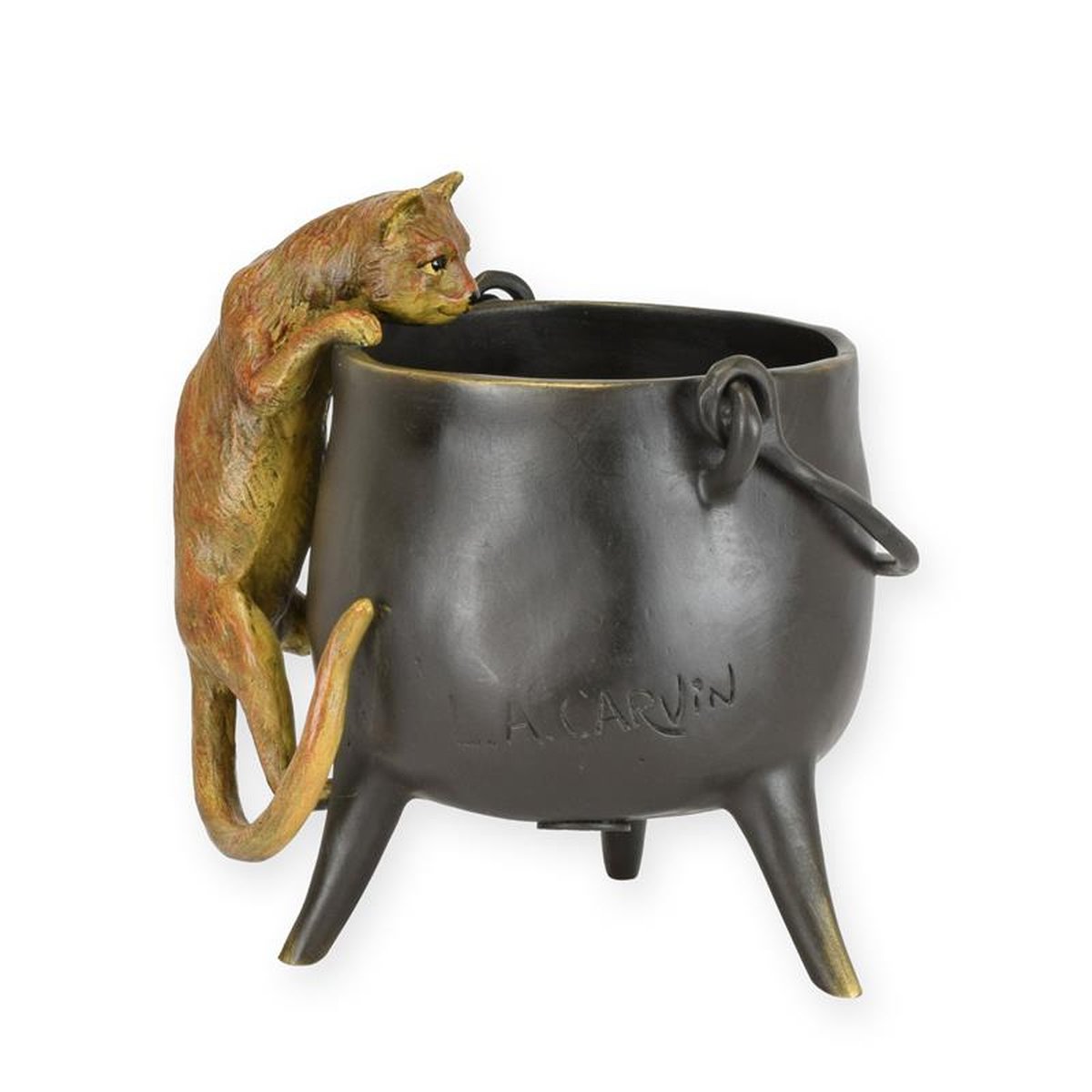 A BRONZE SCULPTURE OF A CAT CLIMBING ON A CAULDRON