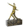 A BRONZE SCULPTURE OF A CAUCASIAN DANCER