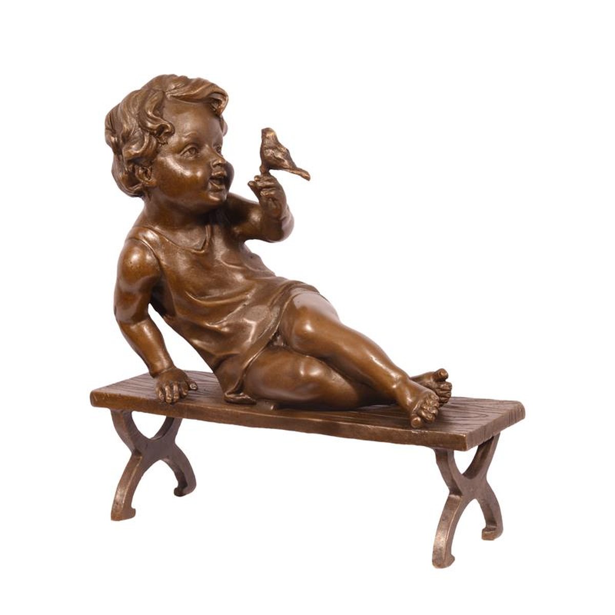A BRONZE SCULPTURE OF A CHILD WITH BIRD ON BENCH