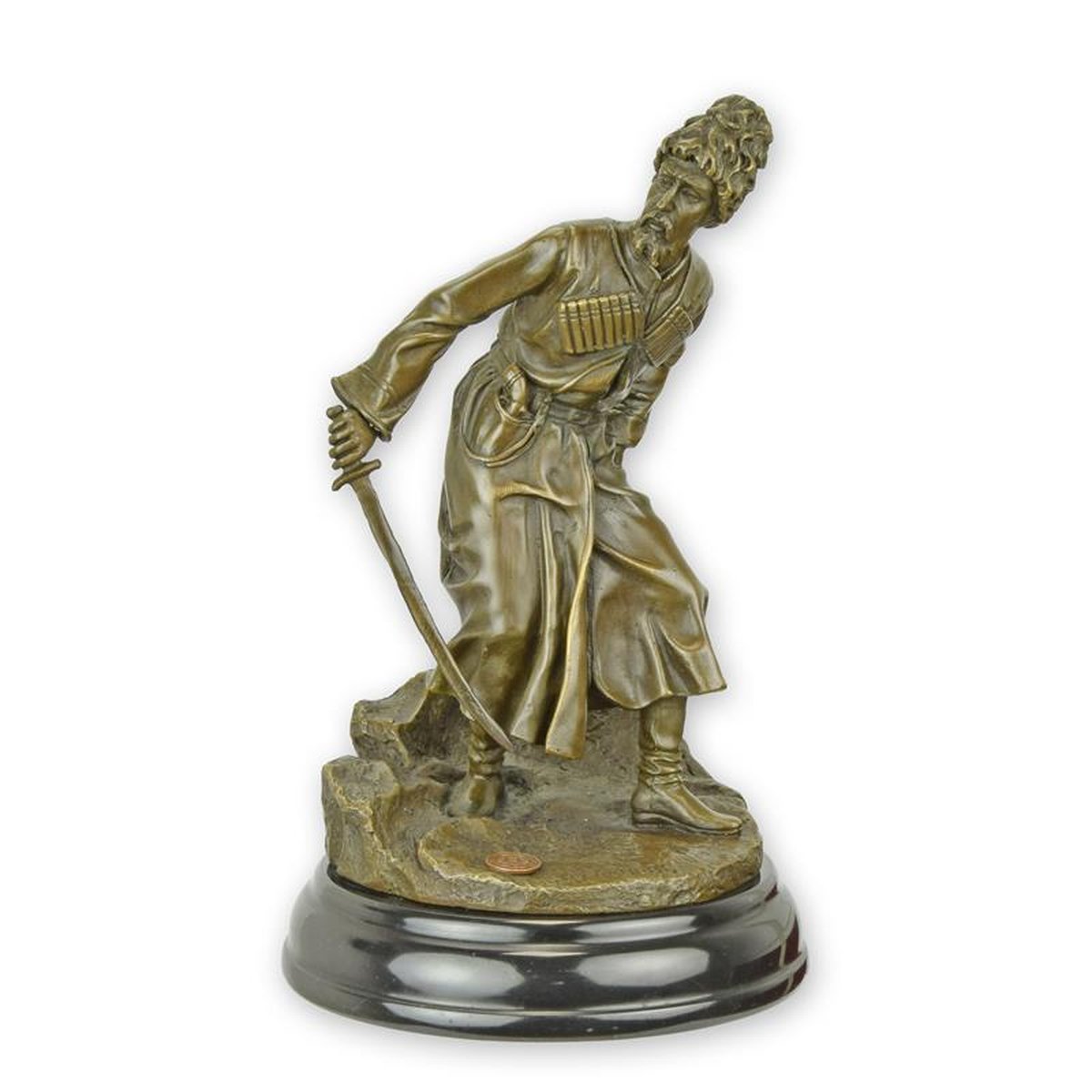 A BRONZE SCULPTURE OF A COSSACK