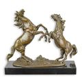 A BRONZE SCULPTURE OF A COUPLE OF REARING HORSES